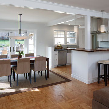 AFTER:  View of new kitchen and dining area from living room