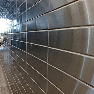 Modern Garage with Stainless Steel Walls