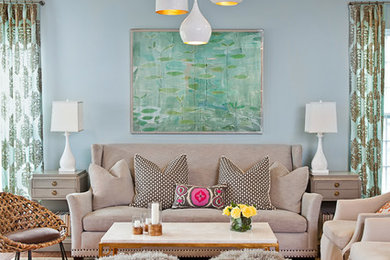 Inspiration for a transitional formal living room remodel in Charlotte with blue walls