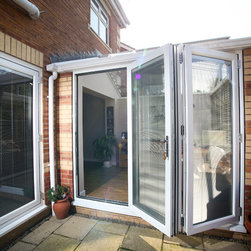 White Conservatory with PVCu Bi-Fold Doors - Products