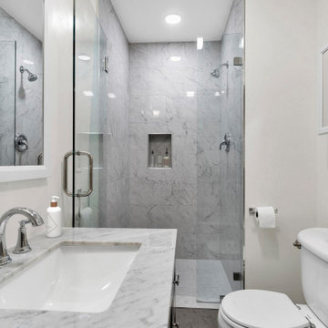 Modern Marble Walk-In Shower and Vanity Combo in Irvine Guest Bathroom