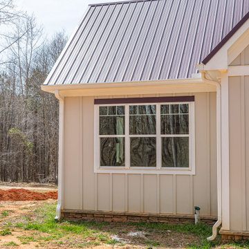 Single-hung windows feature Craftsman-style grids