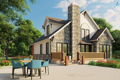 Example of a mid-sized arts and crafts multicolored two-story stone and board and batten exterior home design in Wilmington with a tile roof and a gray roof