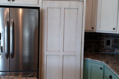 Example of an eclectic kitchen design in Other