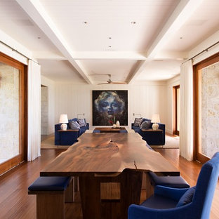 Design ideas for a large tropical open plan dining in Hawaii with white walls, medium hardwood floors, no fireplace and brown floor.