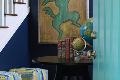 Small beach style medium tone wood floor entryway photo in Grand Rapids with blue walls and a blue front door
