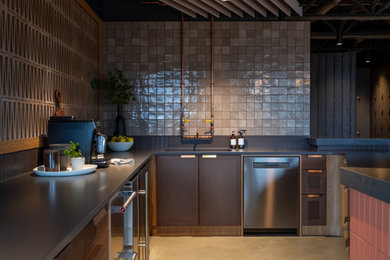Large urban u-shaped concrete floor, gray floor and exposed beam eat-in kitchen photo in Other with a single-bowl sink, concrete countertops, stainless steel appliances, a peninsula and gray countertops