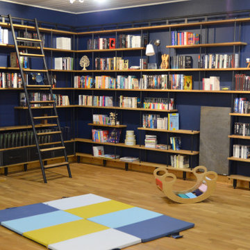 Bibliothèque industrielle sur mesure ACAMAS : métamorphose d'un salon familial