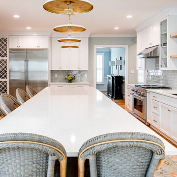 Expansive Kitchen Island with Custom Storage and Seating