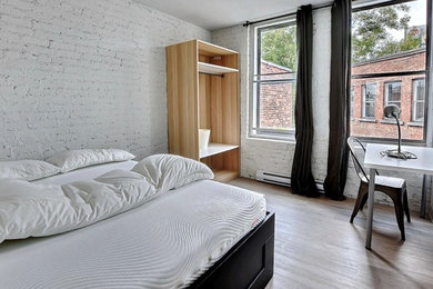 Example of a trendy bedroom design in Montreal