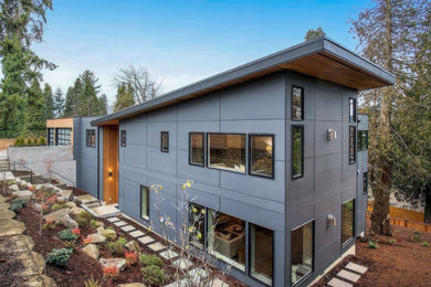 シアトルにあるラグジュアリーなコンテンポラリースタイルのおしゃれな家の外観 (コンクリート繊維板サイディング) の写真
