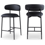 Meridian Furniture - Lupita Upholstered Counter Stool, Black, Vegan Leather, Matte Black, Set of 2 - Grace, comfort, and elegance collide in the design of this Lupita black vegan leather counter stool. Upholstered in soft black vegan leather and supported by a matte black metal frame, it radiates luxury and modern sophistication. Perfect for kitchen islands or home bars, its counter height and contemporary design ensure both style and comfort. Elevate your space with this statement piece that harmonizes versatility and aesthetic appeal, promising to be a stunning addition to the space of your choice.
