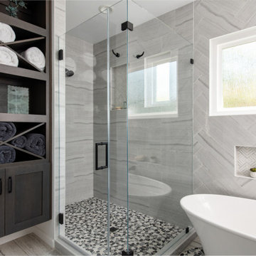 Walk-in Shower with Porcelain Tile and Pebble Flooring