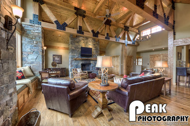 Mountain style family room photo in Other