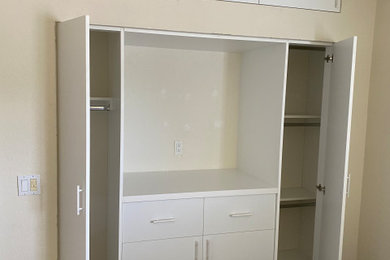 Closet - contemporary closet idea in Other