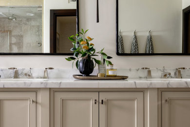 Inspiration for a transitional master double-sink bathroom remodel in San Diego with beige cabinets, marble countertops and a built-in vanity