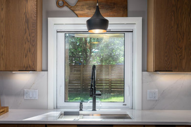Example of a minimalist kitchen design in Other