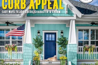 Inspiration for a mid-sized craftsman blue one-story concrete fiberboard house exterior remodel in Wilmington with a hip roof and a shingle roof