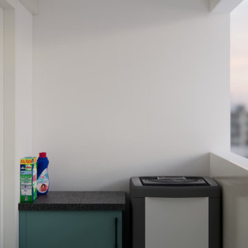 Compact Laundry Room with Teal Cabinetry