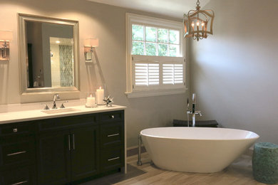 Bathroom - large transitional master multicolored tile and ceramic tile porcelain tile bathroom idea in Chicago with shaker cabinets, dark wood cabinets, a two-piece toilet, gray walls, an undermount sink and quartz countertops