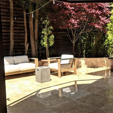 Split Level Travertine Patio and Ipe Deck with Cable Railing