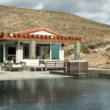 Gorgeous Infinity Pool with Multiple Outdoor Living Spaces
