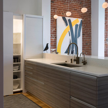 Modern Loft Kitchen with Wall Storage + Appliance Garage