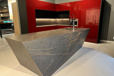 Inspiration for a large contemporary eat-in kitchen remodel in Seattle with a drop-in sink, flat-panel cabinets, red cabinets and an island