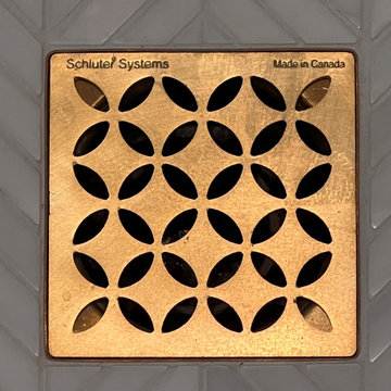 Schluter Drain Holds its Own in the Brass Finish & Mosaic Pattern!