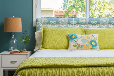 Inspiration for an eclectic guest carpeted bedroom remodel in San Diego with blue walls and no fireplace