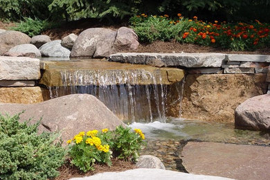 Inspiration for a traditional landscaping in Other.
