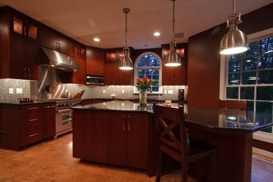 Example of a mid-sized trendy l-shaped eat-in kitchen design in Richmond with medium tone wood cabinets and an island