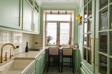 This is an example of a small classic u-shaped kitchen in Moscow with no island.