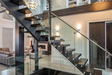 Large transitional wooden l-shaped open and glass railing staircase photo in Other