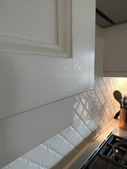 shiny marks on white cupboards