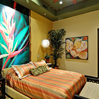 Inspiration for a mid-sized tropical home design remodel in Phoenix