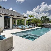 Pool and patio  covered area open patio furniture pool loungers and ove