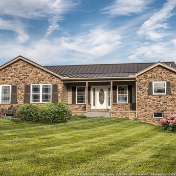 House with Textured Bronze Standing Seam Room