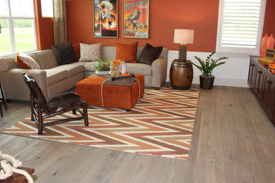 Inspiration for a large country loft-style family room in Sacramento with a game room and medium hardwood floors.