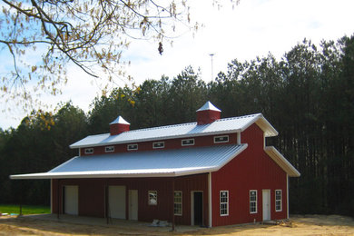 Example of a country exterior home design in Other
