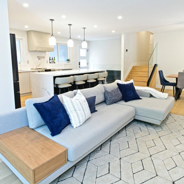 Sectional Sofa and Geometric Rug with an Open Kitchen Backdrop | North York