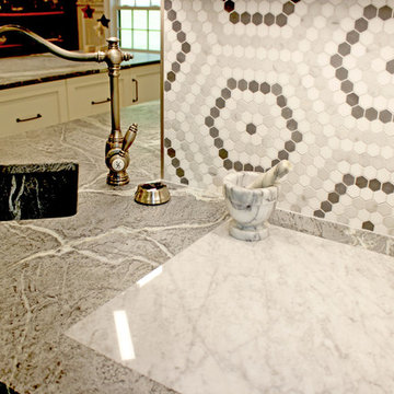 White Cabinets, Grey Countertops and Edgy Tile Backsplash