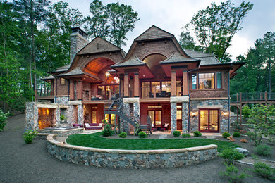Example of a classic two-story exterior home design in Other