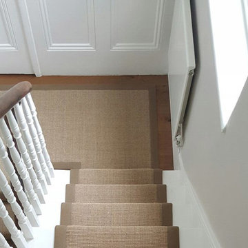 Supplying & Installing Brown Carpet With Brown Border to Stairs