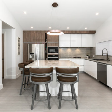 Urban Coffee Kitchen with Oversized Island and Barstools in South Florida