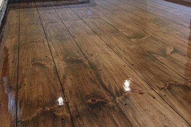 Oil-based finish applied to this wide-plank pine flooring