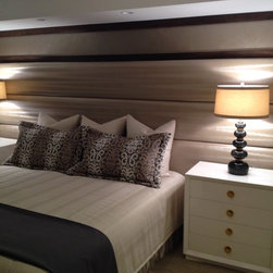 Upholstered wall, custom bedding.  Design by Karen Gomez - Bedding