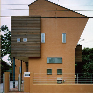 Inspiration för ett skandinaviskt oranget hus