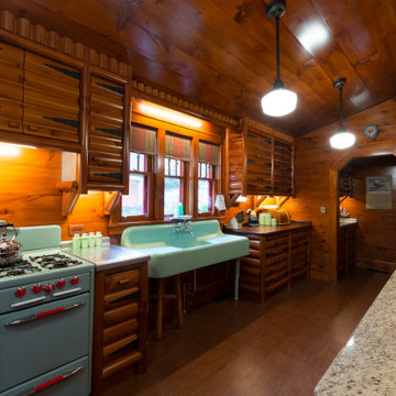 Rustic Storybook Style Quarter Log Siding Lodge
