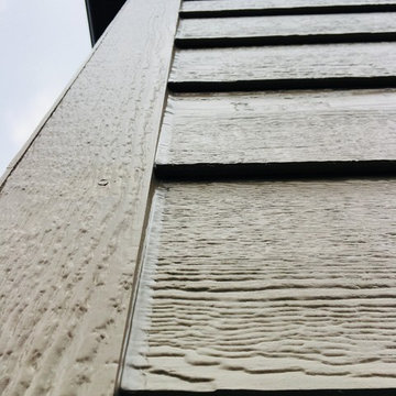 Diamond Kote siding, aluminum Dark bronze soffit and gutters